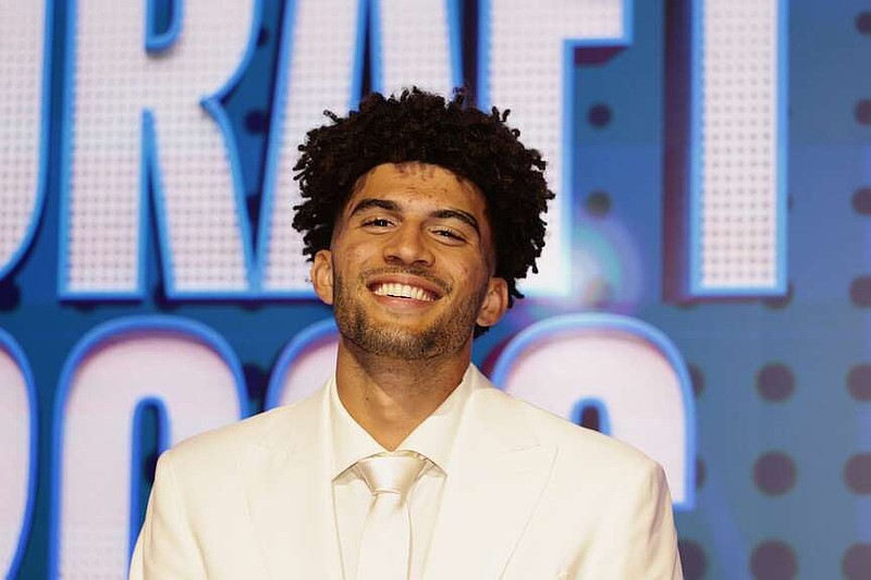 Cameron Boozer arrives for the first round of the NBA basketball draft Tuesday, June 23, 2026, in New York. (AP Photo/Adam Hunger)