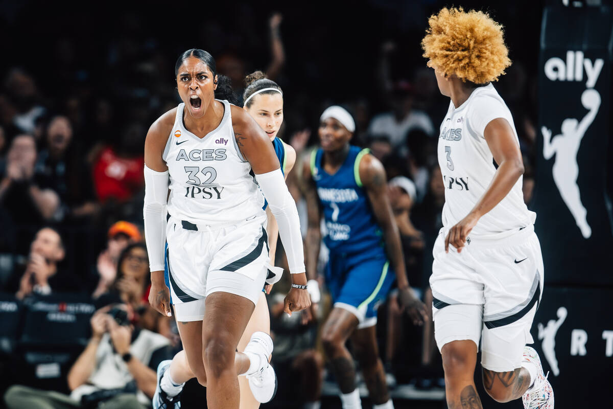 Aces forward Cheyenne Parker-Tyus (32) celebrates a shot during a WNBA basketball game against ...