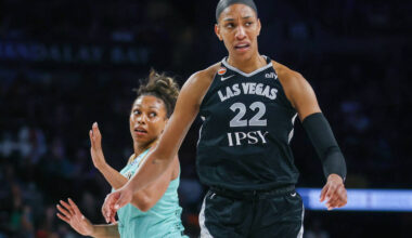 Aces center A'ja Wilson (22) and New York Liberty guard-forward Betnijah Laney-Hamilton (4 ...