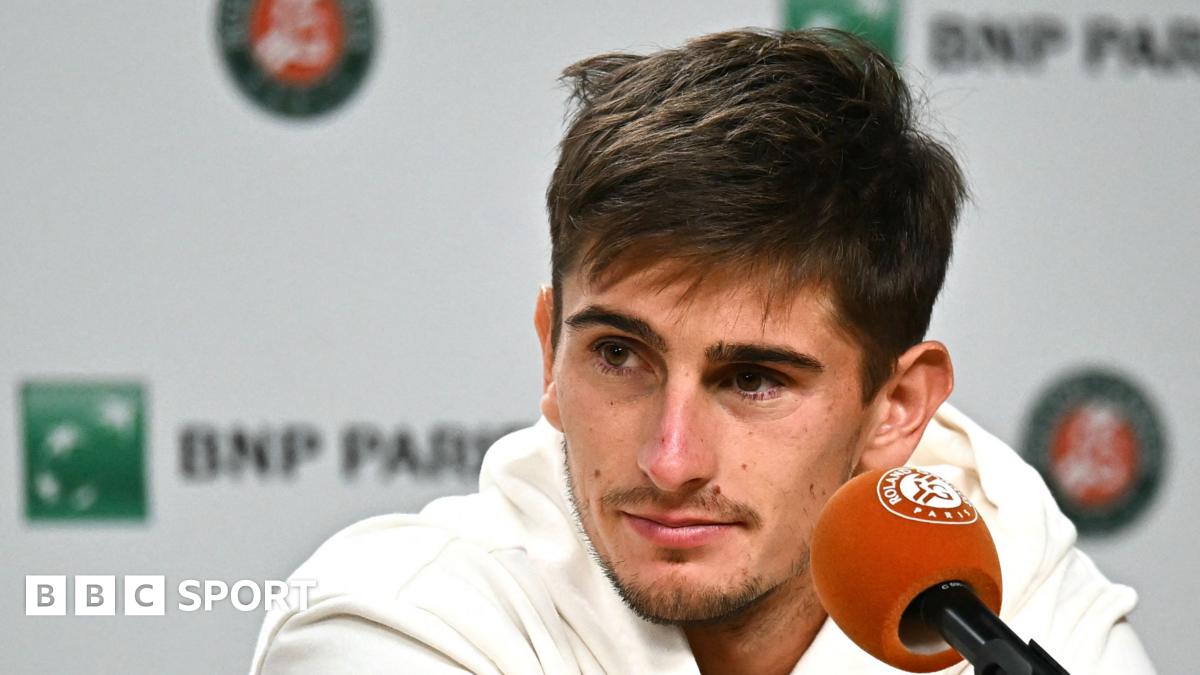 Matteo Arnaldi looks rueful