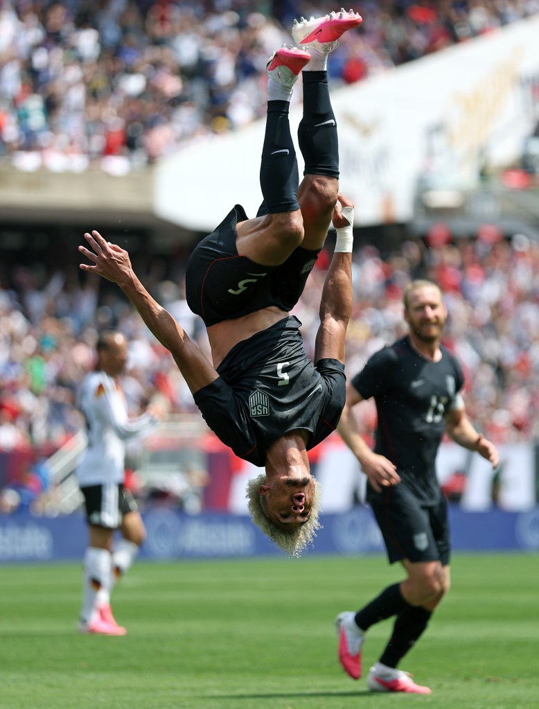 Antonee Robinson #5 of United States celebrates after scoring his team's first goal during the international friendly match between United States and Germany at Soldier Field on June 06, 2026 in Chicago, Illinois.