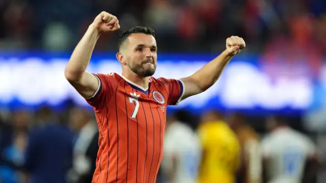 Scotland's John McGinn celebrates following the FIFA World Cup Group C match at the Boston Stadium, Foxborough.