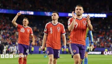 John McGinn, Andy Robertson and Lawrence Shankland salute the travelling Scotland fans