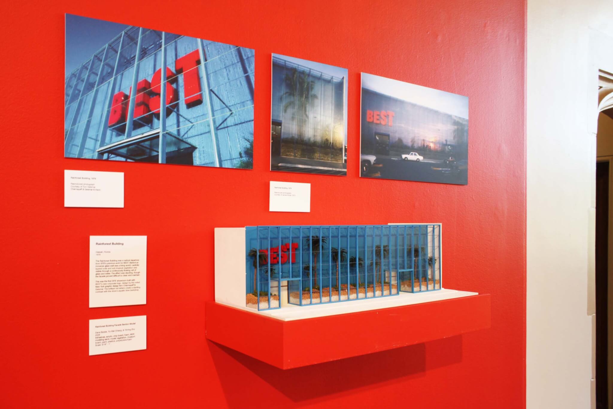model of a Best store hanging on the wall