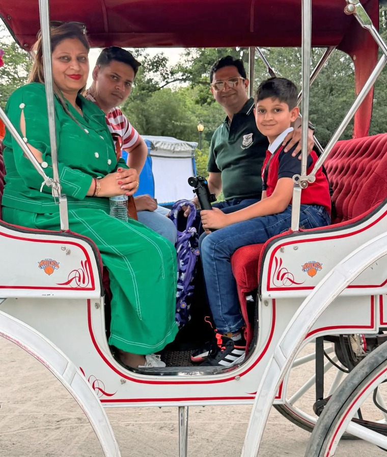 The Mahajan family on their horse-carriage trip in Central Park on Wednesday. From left, Priya, Romanch, Deepak and Maanik.