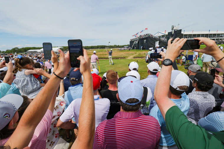 Rory McIlroy plays his tee shot on the fifth hole during the second round of the 2026 U.S. Open in Southampton, N.Y., on Friday.