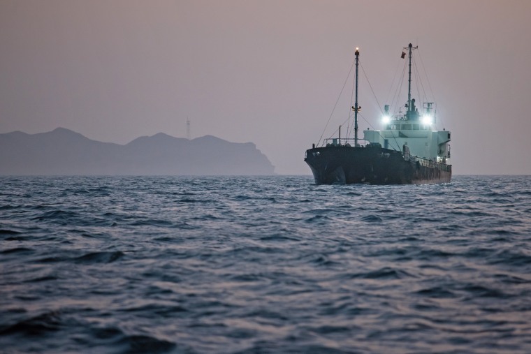 A ship anchored off Port Sultan Qaboos on June 21, 2026 in Muscat, Oman, as the pace of the reopening of the Strait of Hormuz remained unclear.