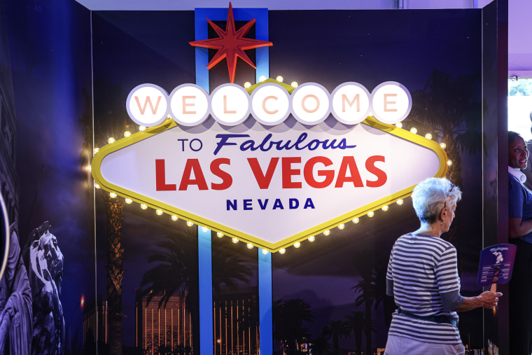 A "Welcome to Las Vegas" sign in a booth.