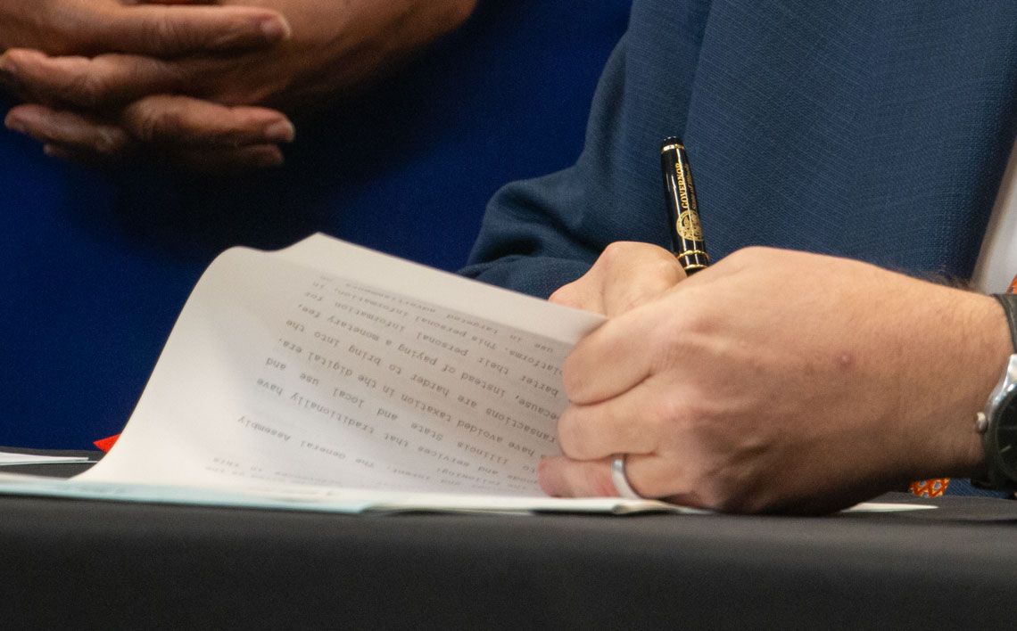 Pritzker signs bills on environmental standards, in-state tuition