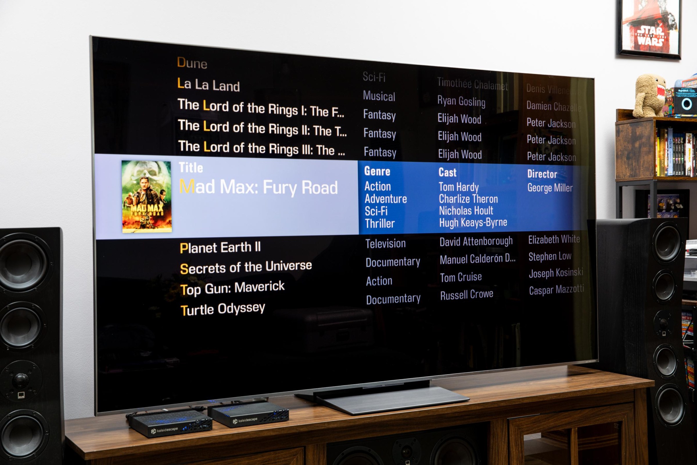 The list view user interface on the Kaleidescape Strato E displayed on a TV.