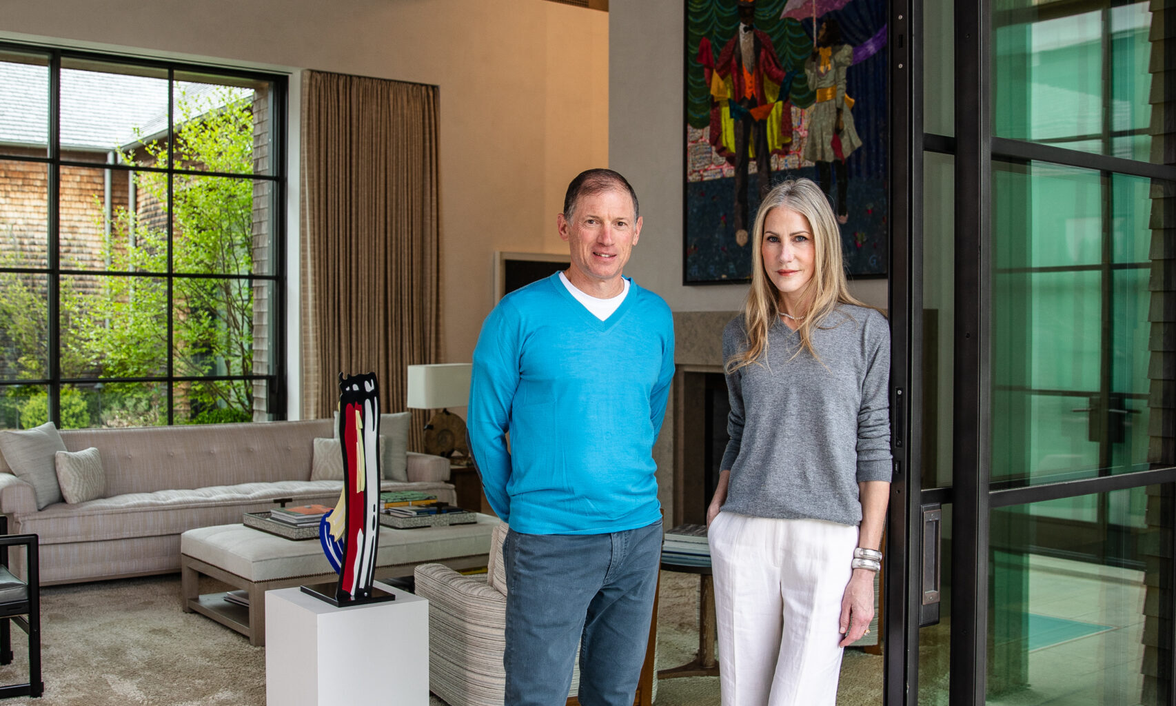 Glenn and Amanda Fuhrman at their home with their art collection