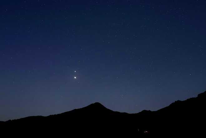 Conjunction of Jupiter and Venus dpatop - 13 August 2025, Bavaria, Schwangau: The planets Jupiter and Venus can be seen in a close conjunction over the Alps in the early morning. Photo: Karl-Josef Hildenbrand/dpa (Photo by Karl-Josef Hildenbrand/picture alliance via Getty Images)