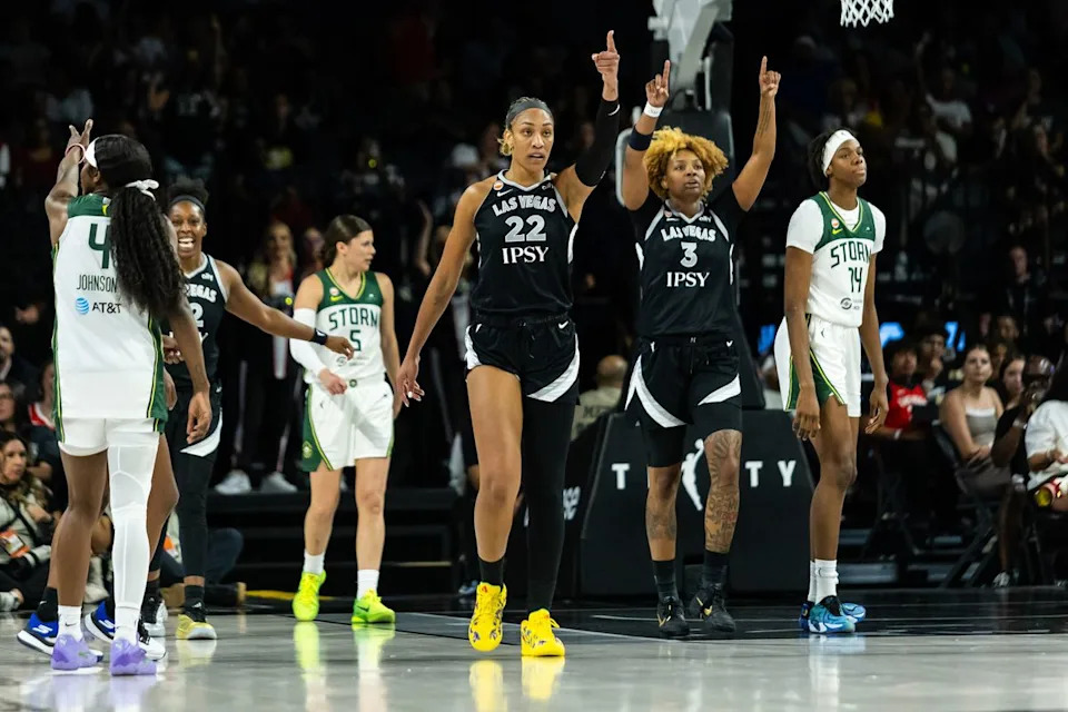 Las Vegas Aces forwards A’ja Wilson (22) and NaLyssa Smith (3) point towards the direction of their basket after a Seattle Storm turnover during a WNBA game between the Las Vegas Aces and the Seattle Storm, Monday June 8, 2026 in Las Vegas, Nev.