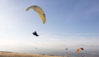 Paragliders fly at the Salt Lake County Flight Park in Draper on Jan. 16. A paraglider was taken to...