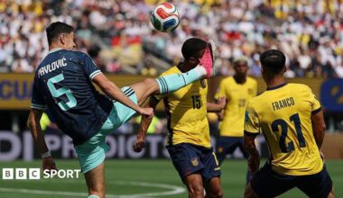 Germany's Aleksandar Pavlovic catches Ecuador's Pedro Vite with a high boot