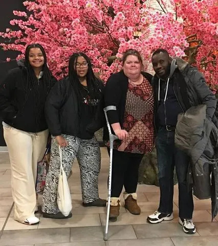 Caroline Fonjack with her husband, Lionel (right) and two daughtersCredit: Cambridge University Hospitals NHS Foundation Trust