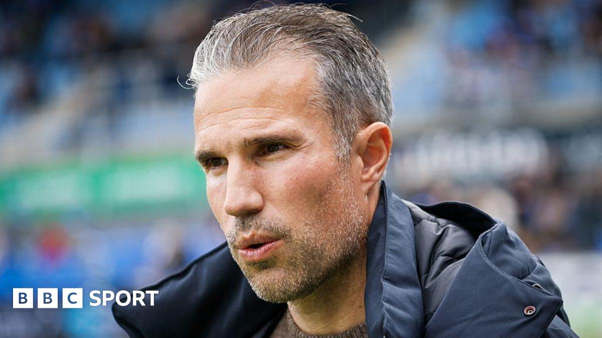 Close up of Robin van Persie wearing a thick coat