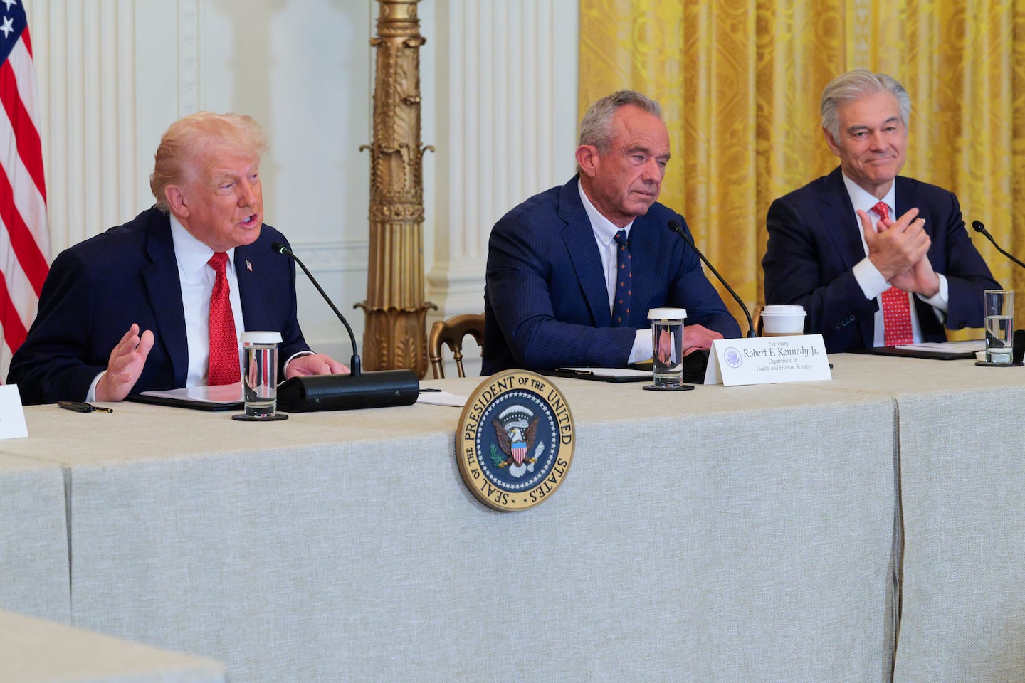 From left to right, President Trump spoke as Secretary of Health and Human Services Robert F. Kennedy Jr. and Dr. Mehmet Oz,  the administrator for the Centers for Medicare & Medicaid Services, reacted during a roundtable at the White House in Washington, D.C., on Jan. 16.