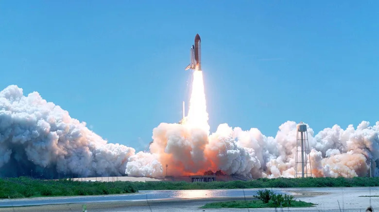 A mid-aughts launch of the Space Shuttle Discovery from Cape Canaveral, FL.