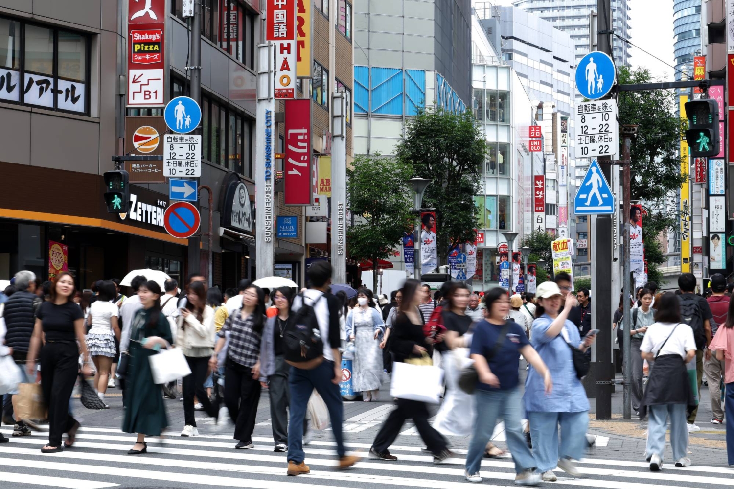 Japan nears longest postwar growth even as households struggle