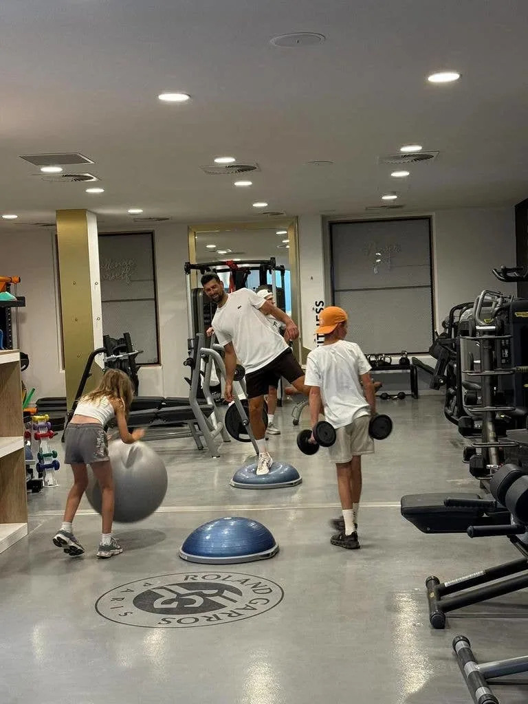 Novak's kids sometimes travel with him when he competes