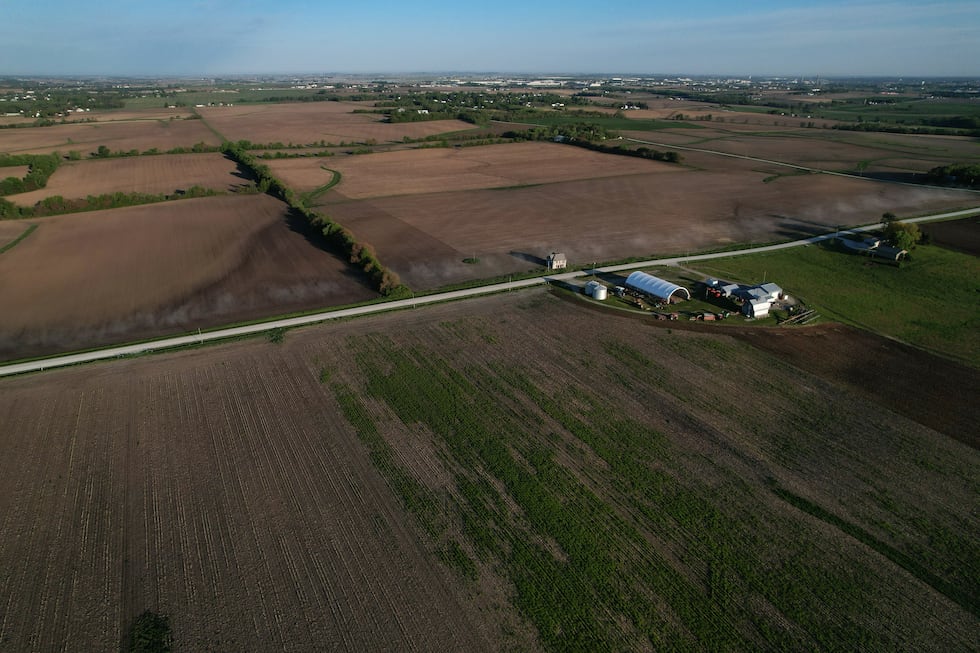 This photo shows farmland Friday, May 8, 2026, near Ely, Iowa. (AP Photo/Brittany Peterson)