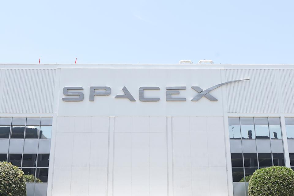 SpaceX signage outside the Space Exploration Technologies Corp. facility in Hawthorne, California, on June 3, 2026. SpaceX is set to begin trading on the Nasdaq under the ticker symbol SPCX. (Photo by Michael Yanow/NurPhoto via Getty Images)