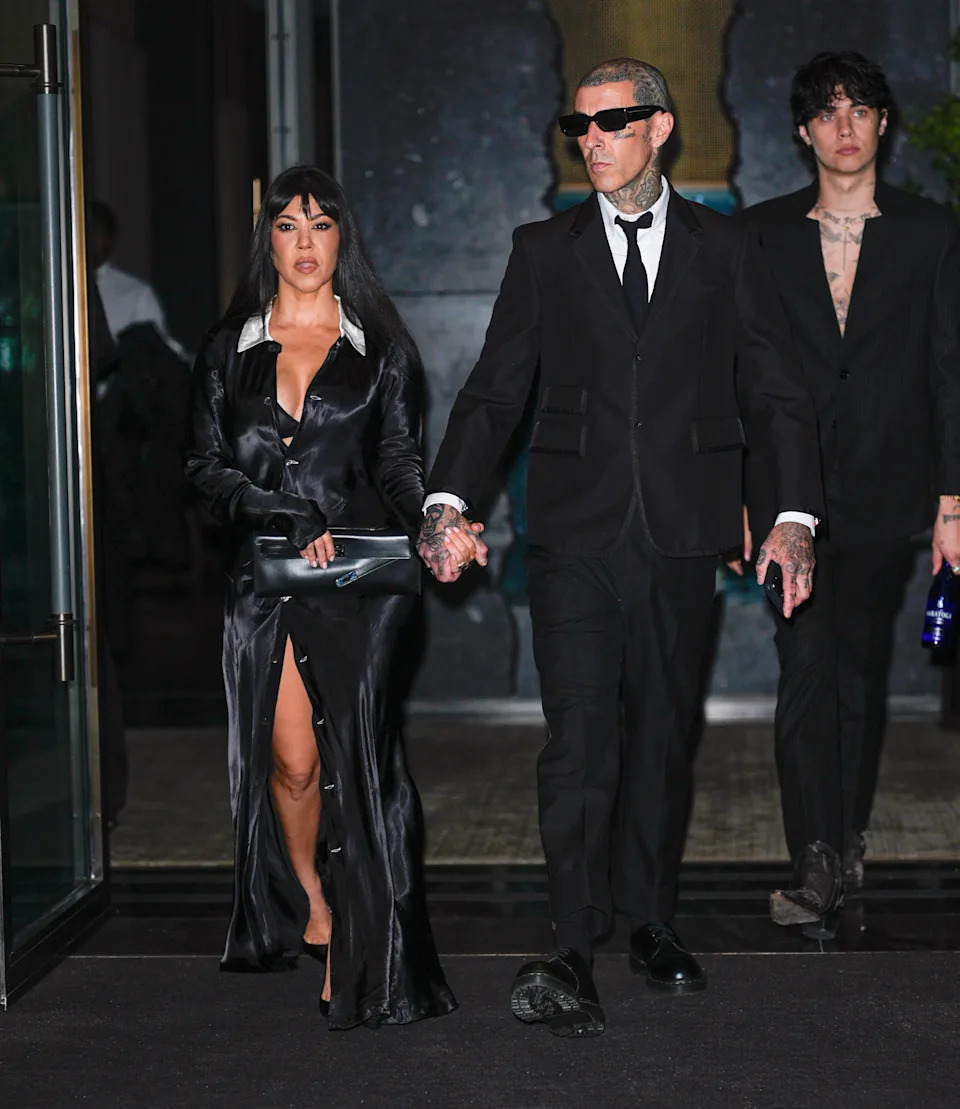 As for Barker, he wore a black suit. ZUMAPRESS.com