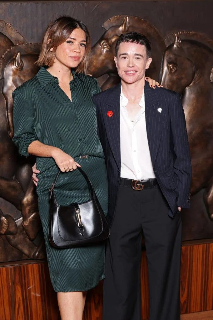 Julia Shiplett and Elliot Page attend the Gucci Spring Summer 2026 photocall during the Milan Fashion Week at Palazzo Mezzanotte on September 23, 2025 in Milan, Italy.