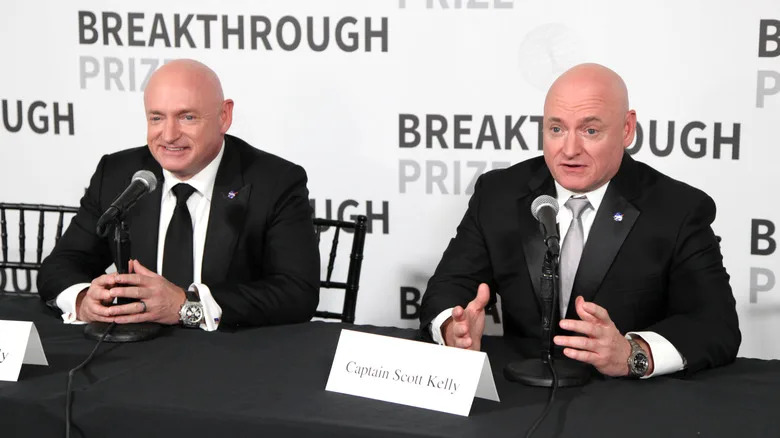 Astronaut Scott Kelly and twin brother Mark at a conference