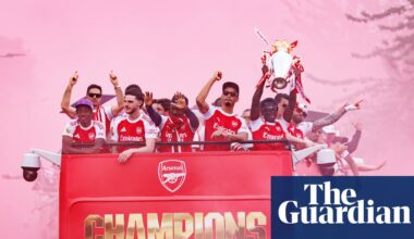Huge crowd watches Arsenal trophy parade in north London – in pictures - The Guardian