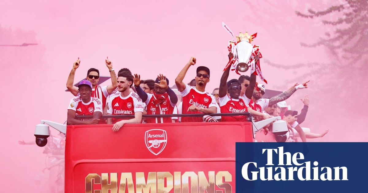Huge crowd watches Arsenal trophy parade in north London – in pictures - The Guardian