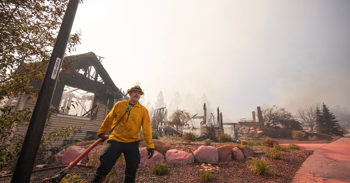 Fast-moving wildfire razes parts of Beacon Hill