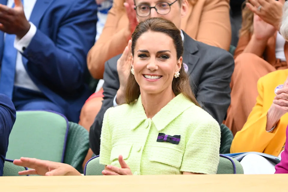 Kate Middleton, among seated spectators.