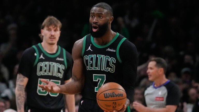 Boston Celtics guard Jaylen Brown (7) questions a call during Game 5 of a first-round NBA playoffs basketball series, Tuesday, April 28, 2026, in Boston.
