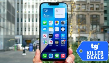 iPhone 16e held in hand with deal badge.
