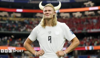 Erling Haaland wearing a plastic viking helmet after Norway beat Ivory Coast