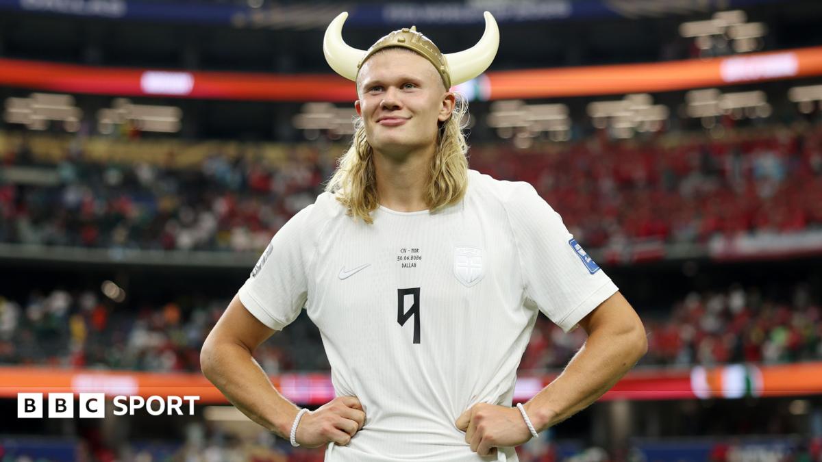 Erling Haaland wearing a plastic viking helmet after Norway beat Ivory Coast
