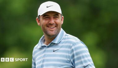 Scottie Scheffler smiles during the second round of the Travelers Championship in 2026