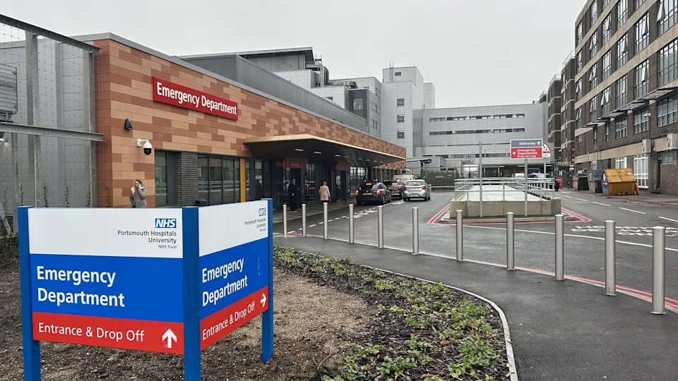 A sign points the way to the emergency department at Queen Alexandra Hospital.