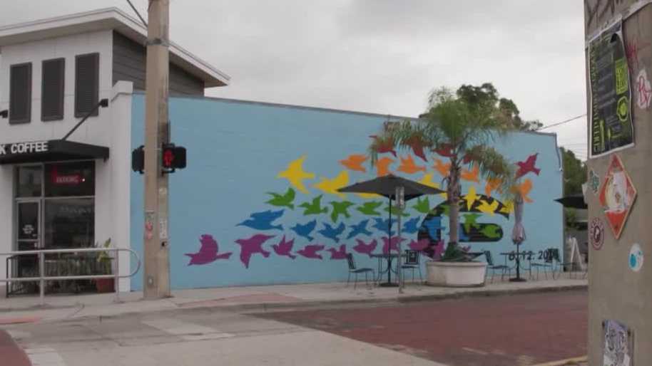 Artist honors Pulse victims after Orlando mural was mistakenly painted over