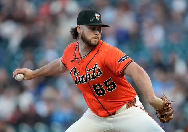 Chicago Cubs v San Francisco Giants SAN FRANCISCO, CALIFORNIA - JUNE 12: Landen Roupp #65 of the San Francisco Giants pitches against the Chicago Cubs in the top of the first inning of a major league baseball game at Oracle Park on June 12, 2026 in San Francisco, California. (Photo by Thearon W. Henderson/Getty Images)