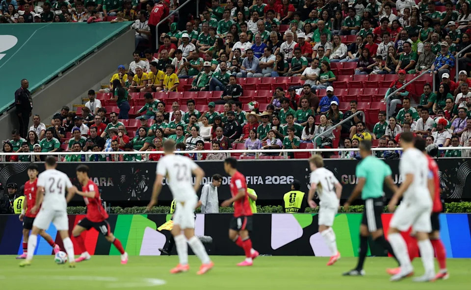 Empty seats are seen in the stands during the match (REUTERS)