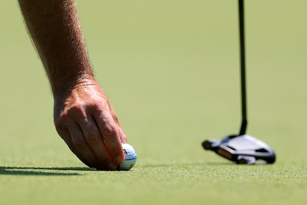 Rules of Golf Review: He rotated his golf ball without marking it. He says it's OK because he didn't lift it. True?