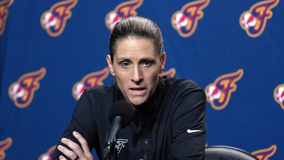 Indiana Fever head coach Stephanie White talks to media members.Darren Yamashita-Imagn Images