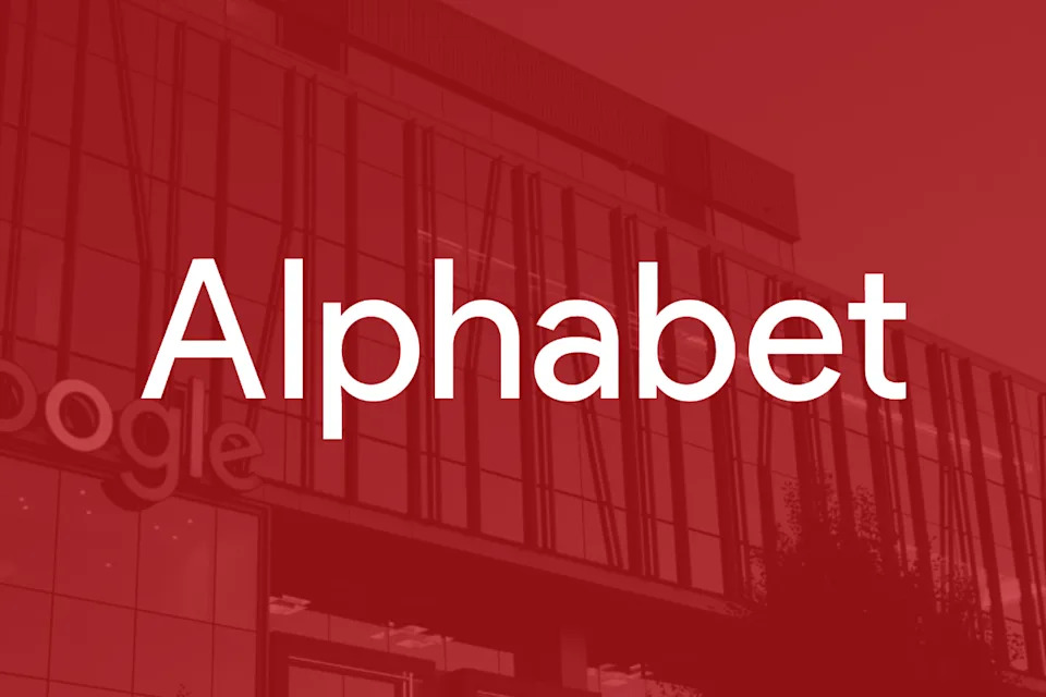 The Alphabet logo superimposed over an image of Google headquarters building.