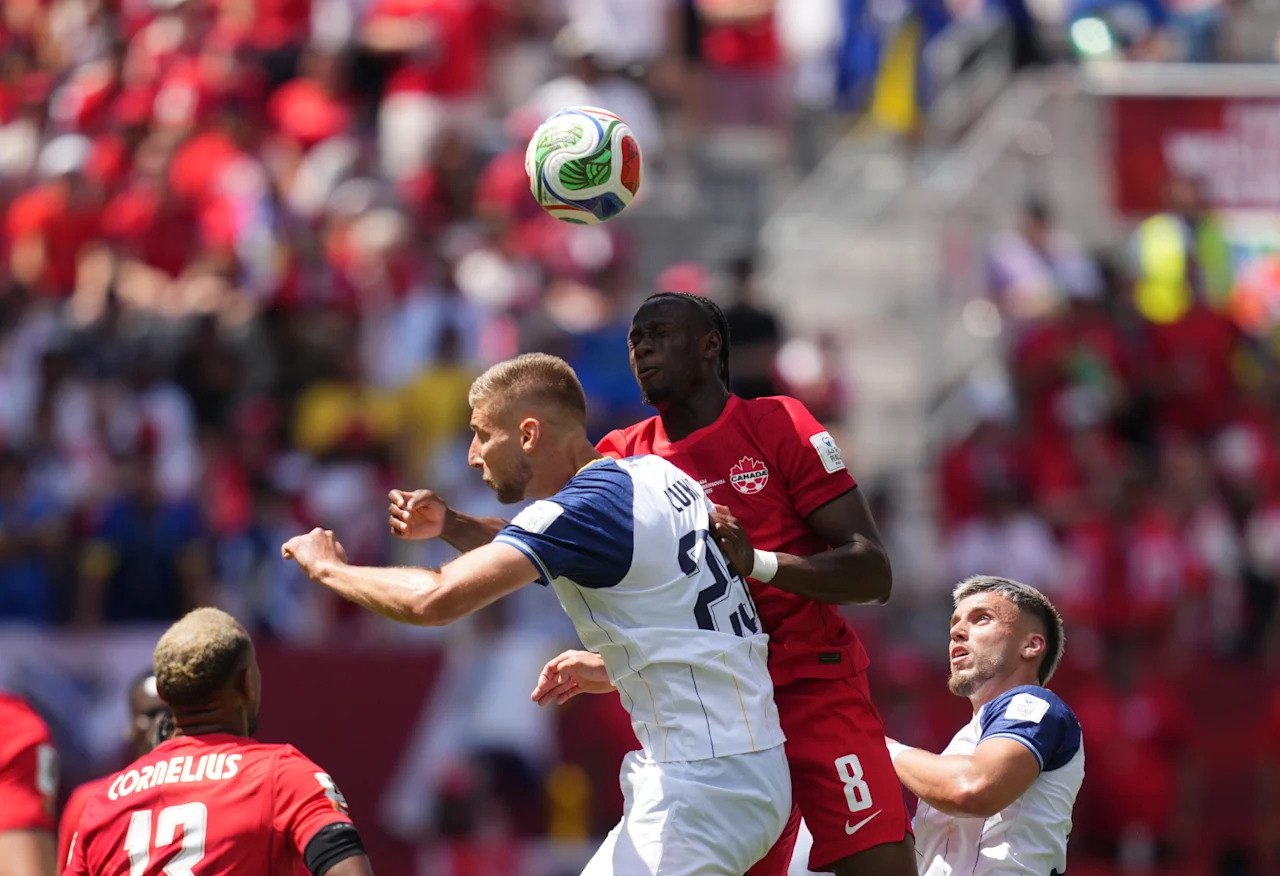 Jovo Lukic (Bosnia And Herzegovina) and Ismael Kone (Canada) battle for the ball during Group B FIFA World Cup 2026, Canada and Bosnia and Herzegovina, Toronto Stadium, Toronto, Canada on June 12 2026. (Photo by Ulrik Pedersen/NurPhoto via Getty Images)