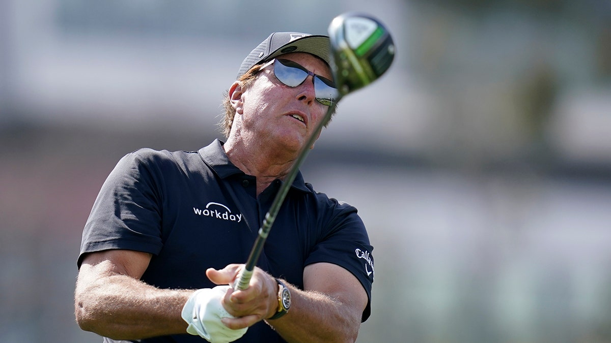 Phil Mickelson watching his tee shot on the 12th hole at Torrey Pines Golf Course