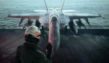 An airman approaches a fighter jet.