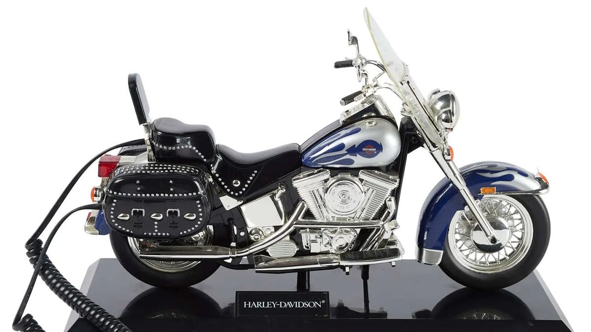 Ann-Margret motorcycle telephone.